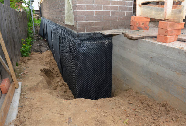 SJ Waterproofing Pros technician performing targeted Waterproofing assessment in North Bergen, NJ